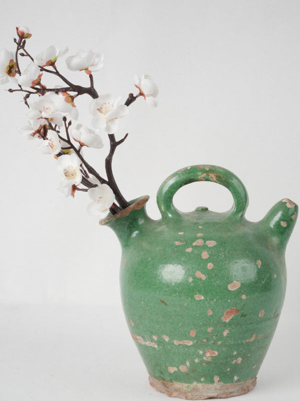 Charming, antique green-glazed French kanti pitcher
