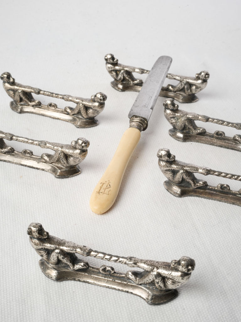 Antique whimsical monkey knife rests  
