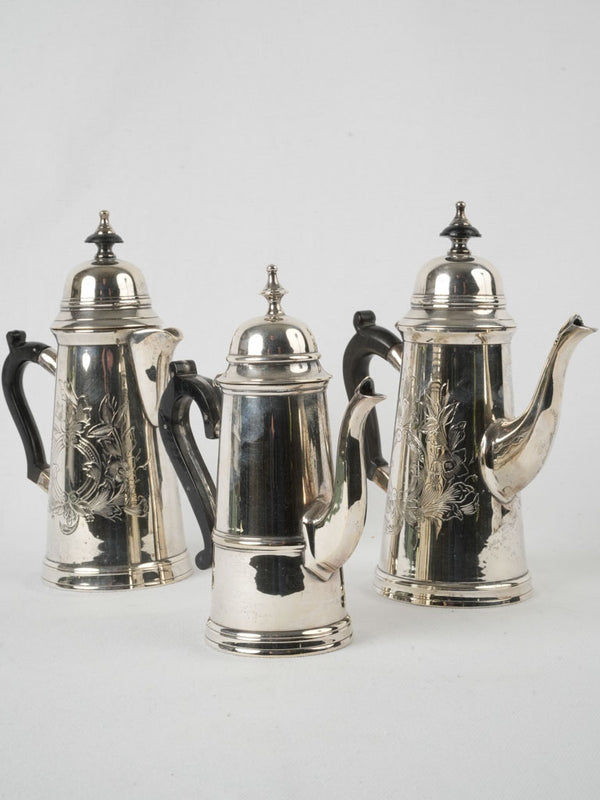 Vintage wood-accented silver coffee pots