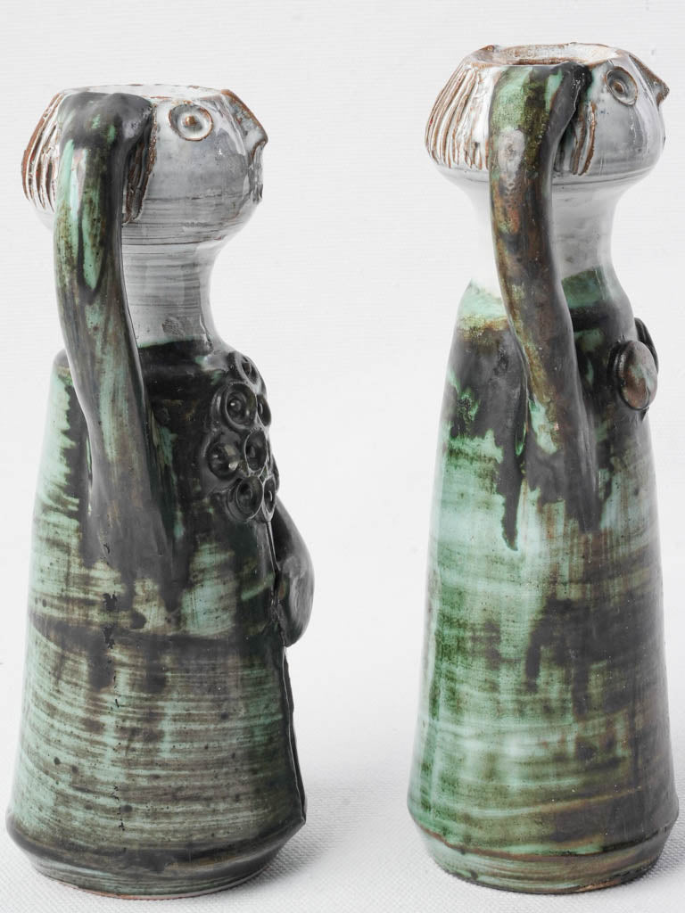 Elongated modernist glazed figures  