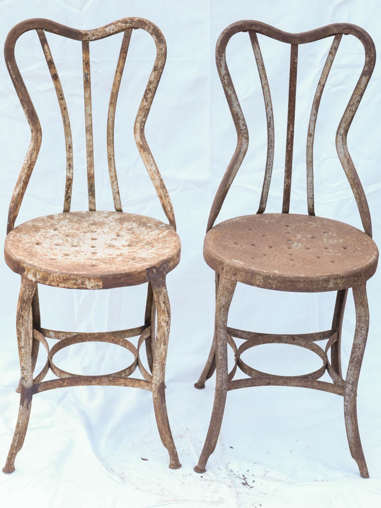 Rustic-style perforated seated chairs  