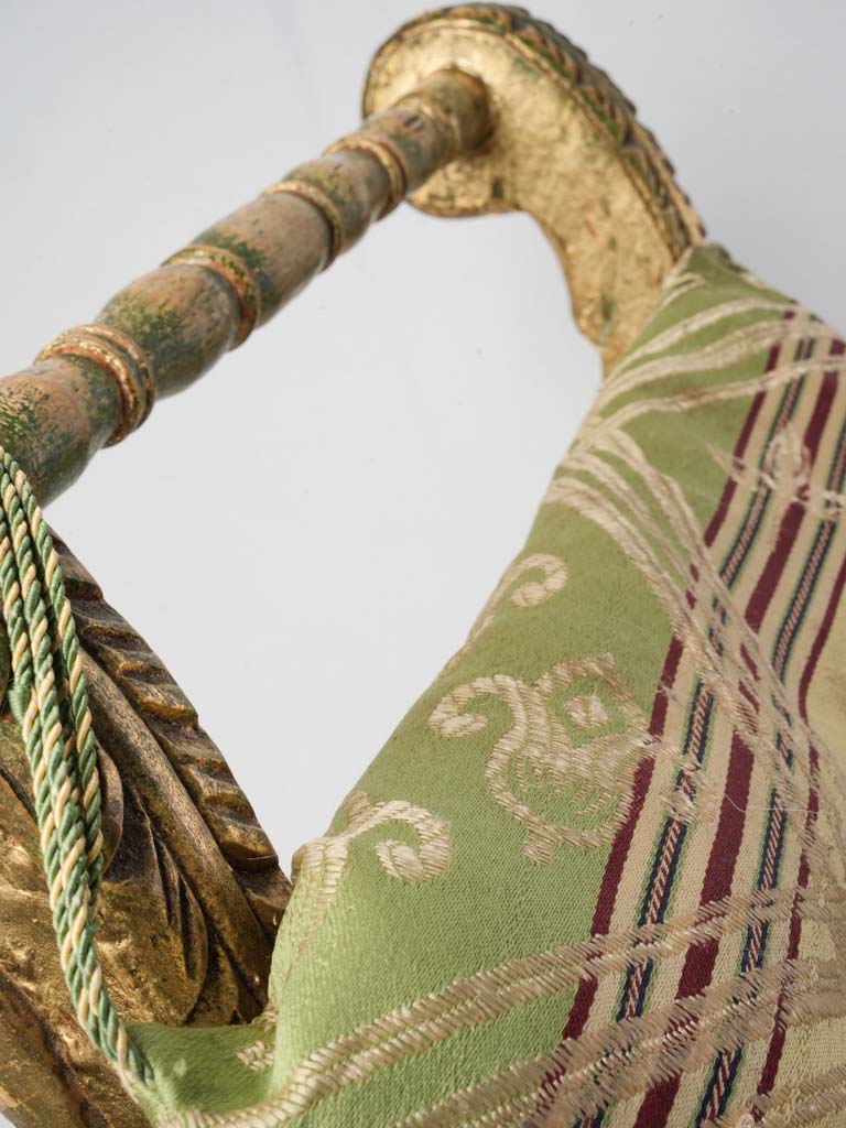 Timeworn gold curule seat