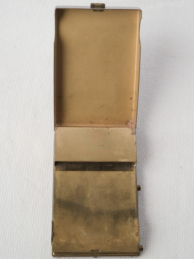 Patinated hinged mirror compact