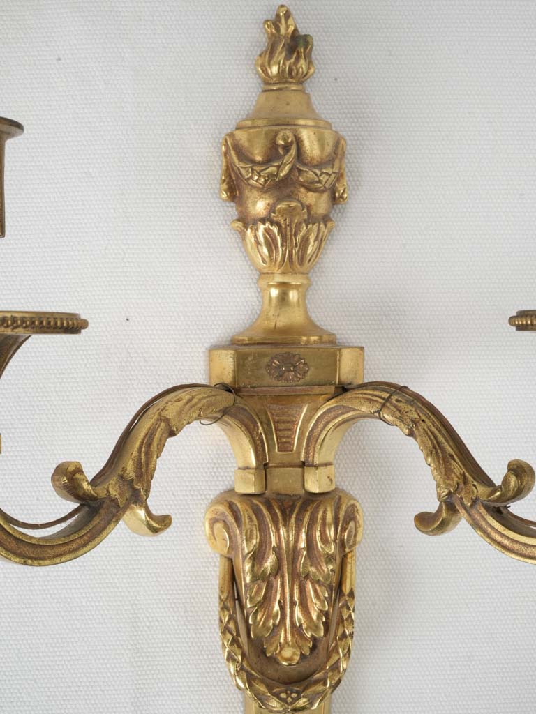 Detailed, aged, ornamental wall sconces