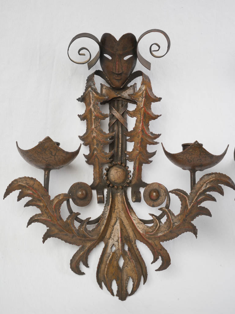 Stylized theatrical mask candle holders  