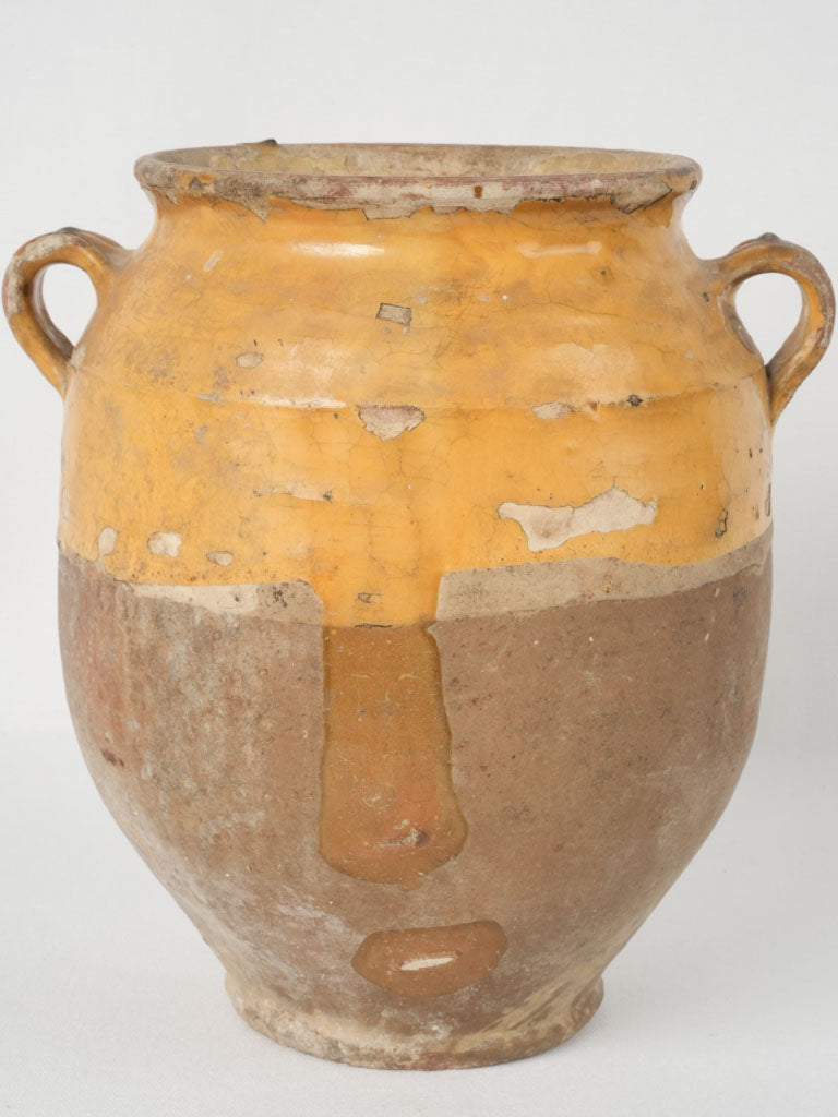 Vintage yellow-glazed terracotta confit pot