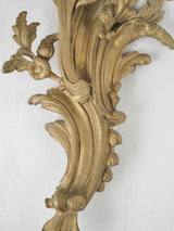 Ornate Louis XV sconces in gilt