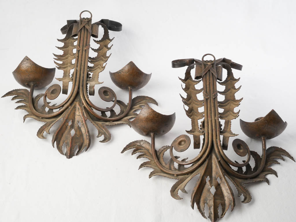 Warm bronze candle wall lights  