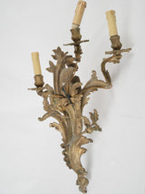 Gilded three-light French sconces