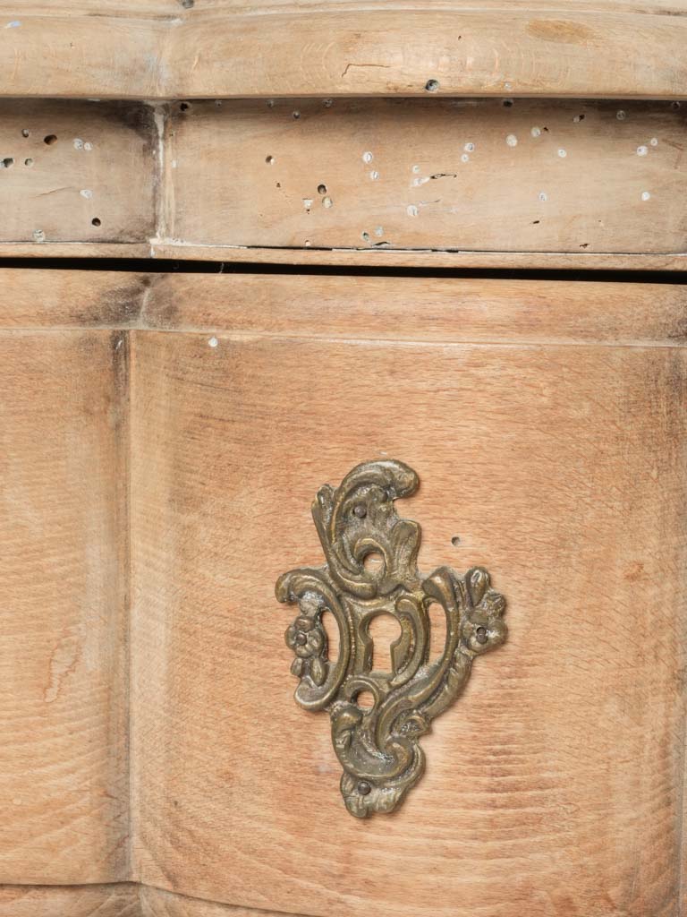Brass-adorned antique drawers