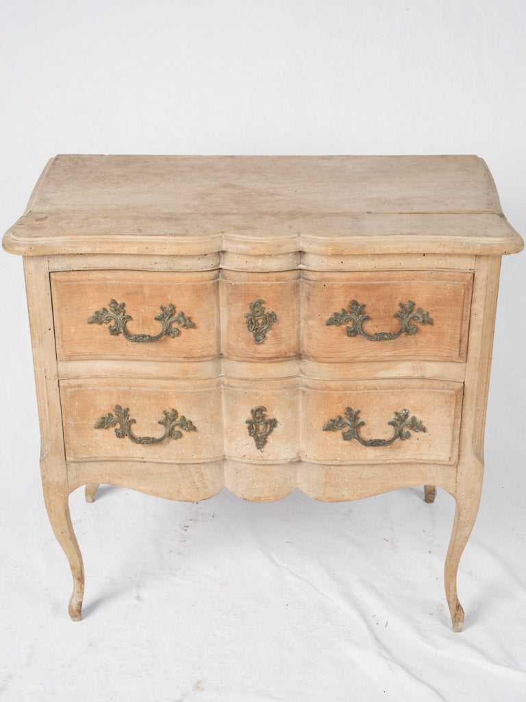 Intricate brass hardware dresser