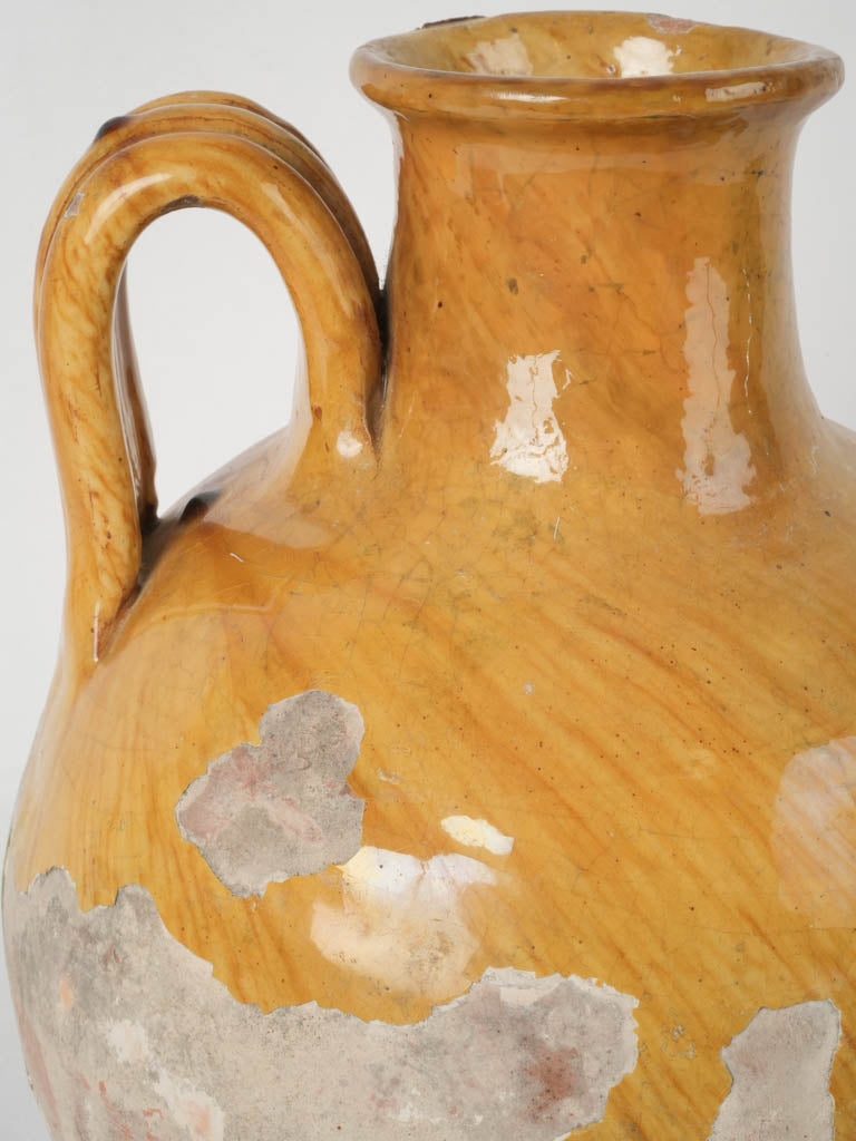 Traditional, cheerful French wine pitcher