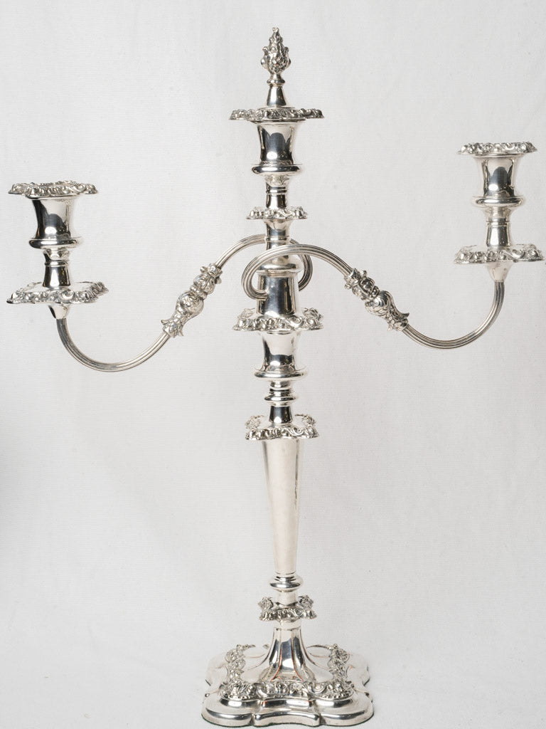 Sculptural period-style copper candle stands