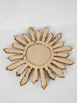 Aged sunburst mirror with French charm