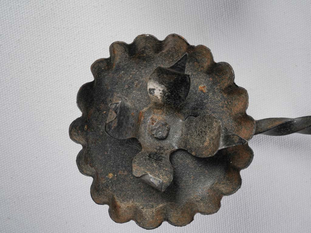 Timeworn vintage iron candleholders  