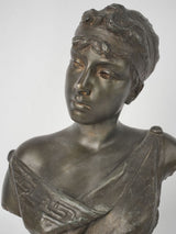 Antique woman bust in bronze-like material