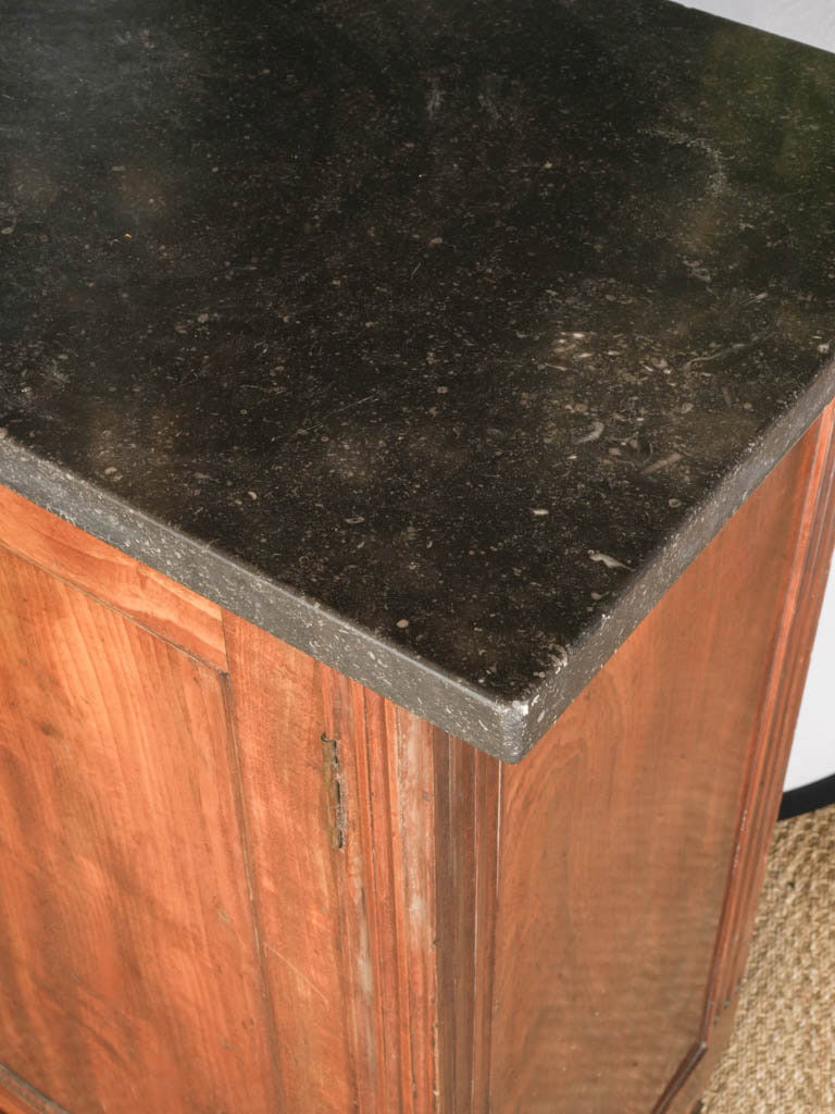 Composed charcoal marble-topped furniture