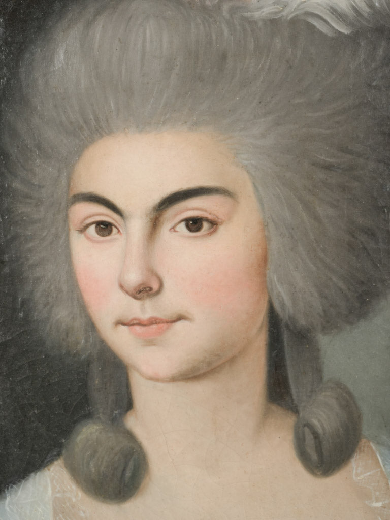Antique woman with a pink rose
