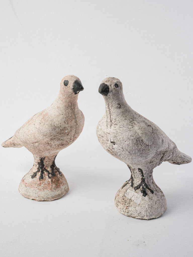 Vintage charming concrete turtledoves statues