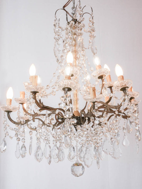 Elegant antique brass chandelier with patina