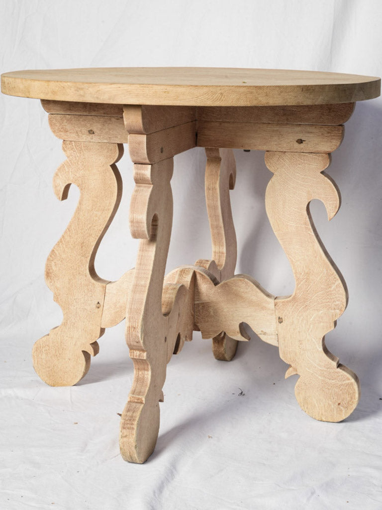 Elegant antique scrolled base guéridons