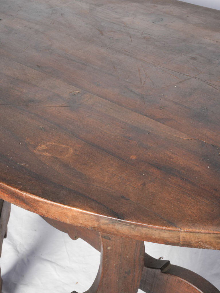Warm patina demi-lune table  