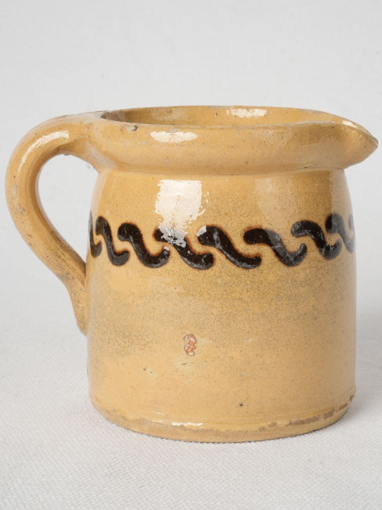 Collectible ocher pottery pitcher