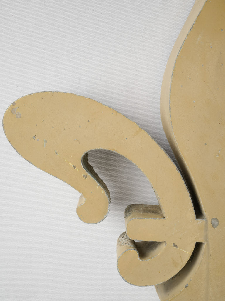 Patina-aged zinc fleur de lys
