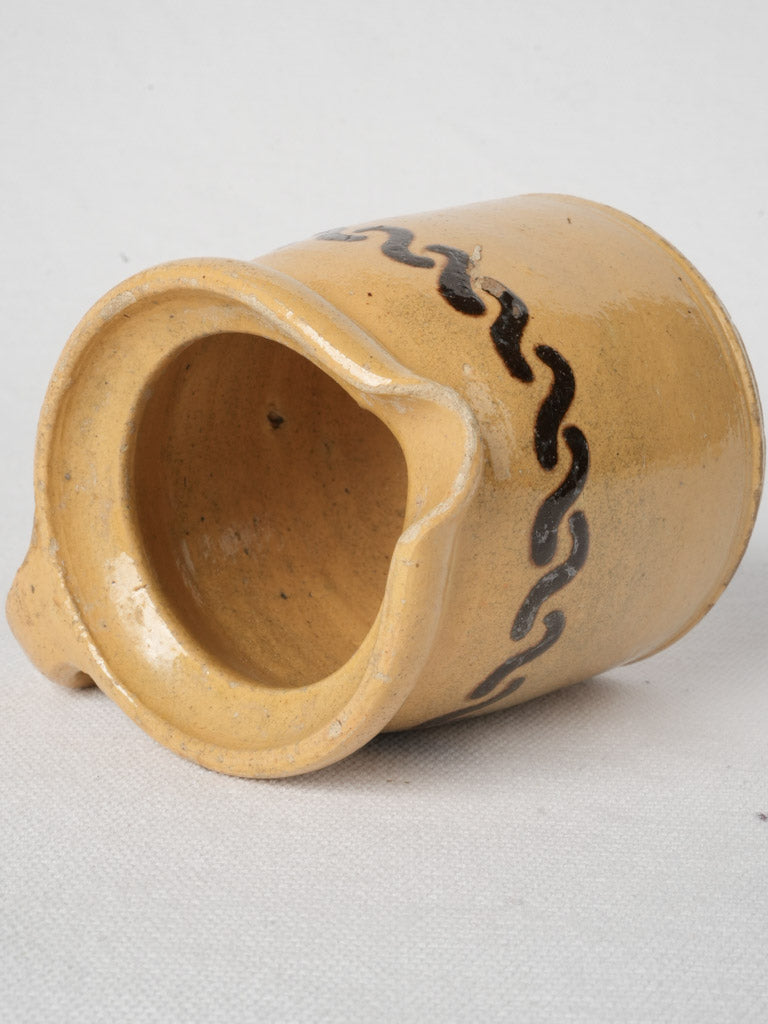 Elegant handcrafted ocher jug