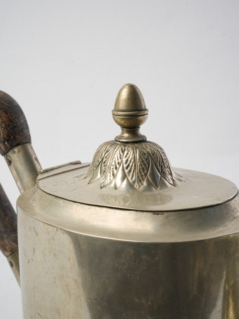 Mirror-like silver vintage teapot