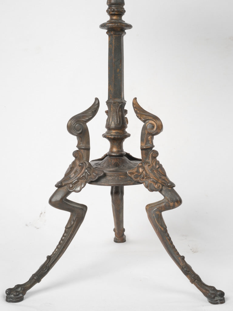 Classic, ornate cast iron pedestal table