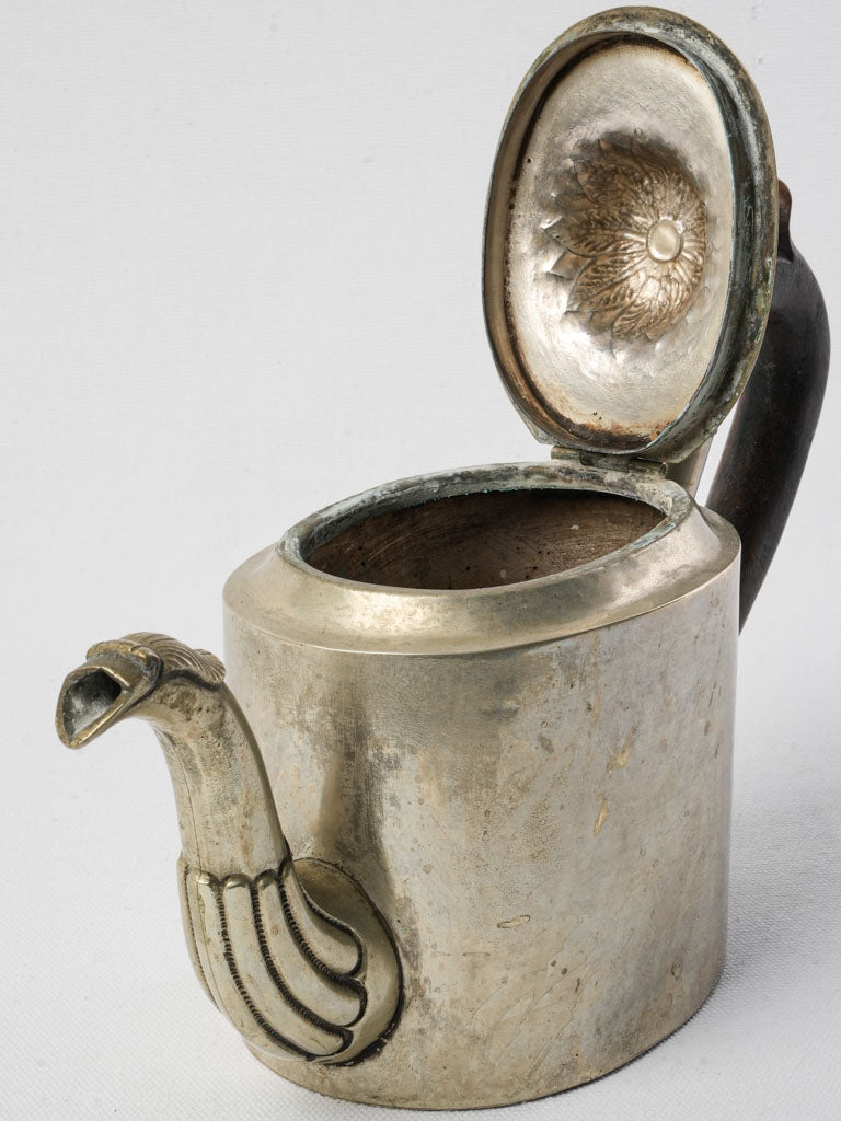Whimsical sculptural silverware teapot