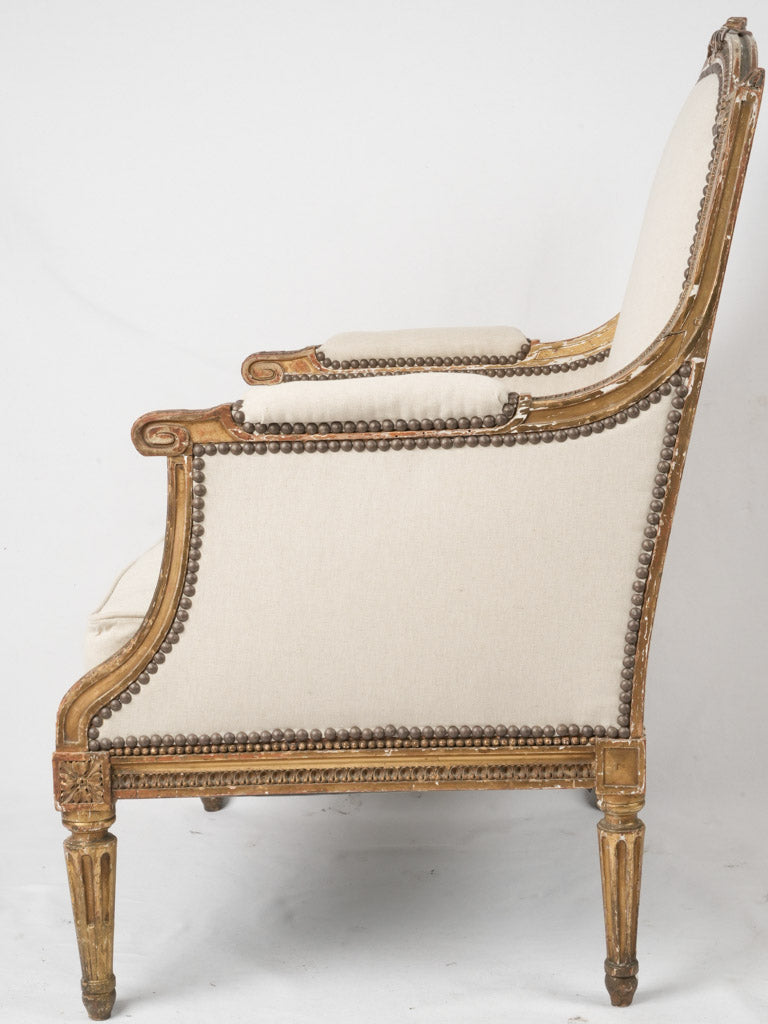 Linen upholstered antique reading chair