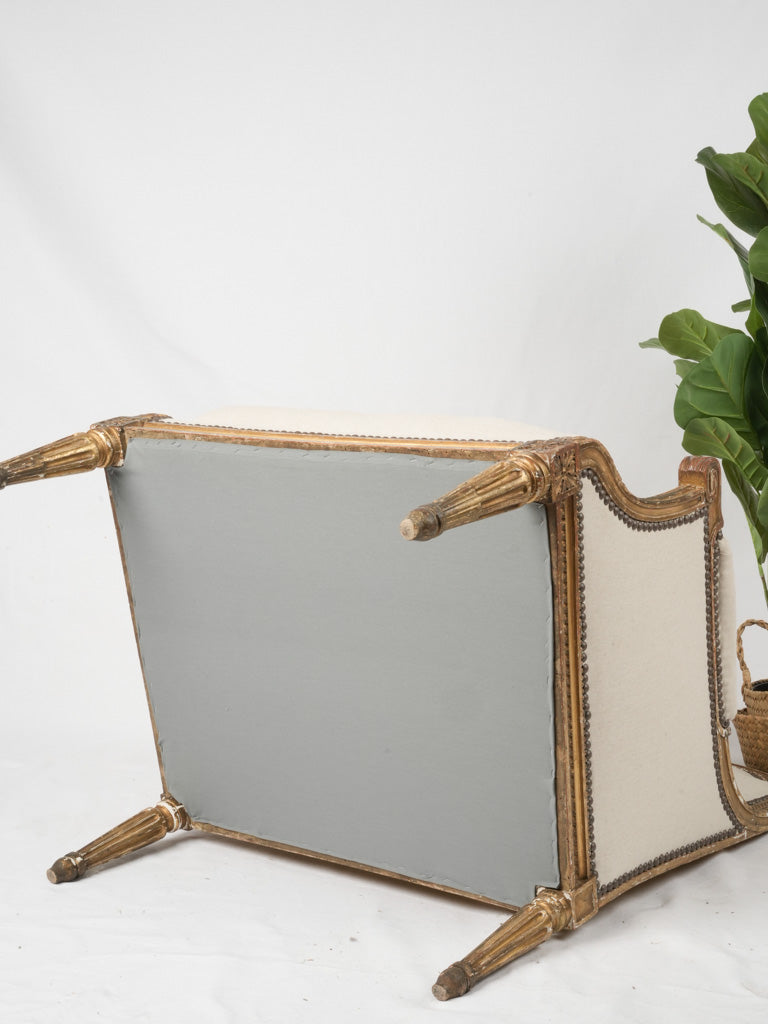 Versatile French gilded wood armchair