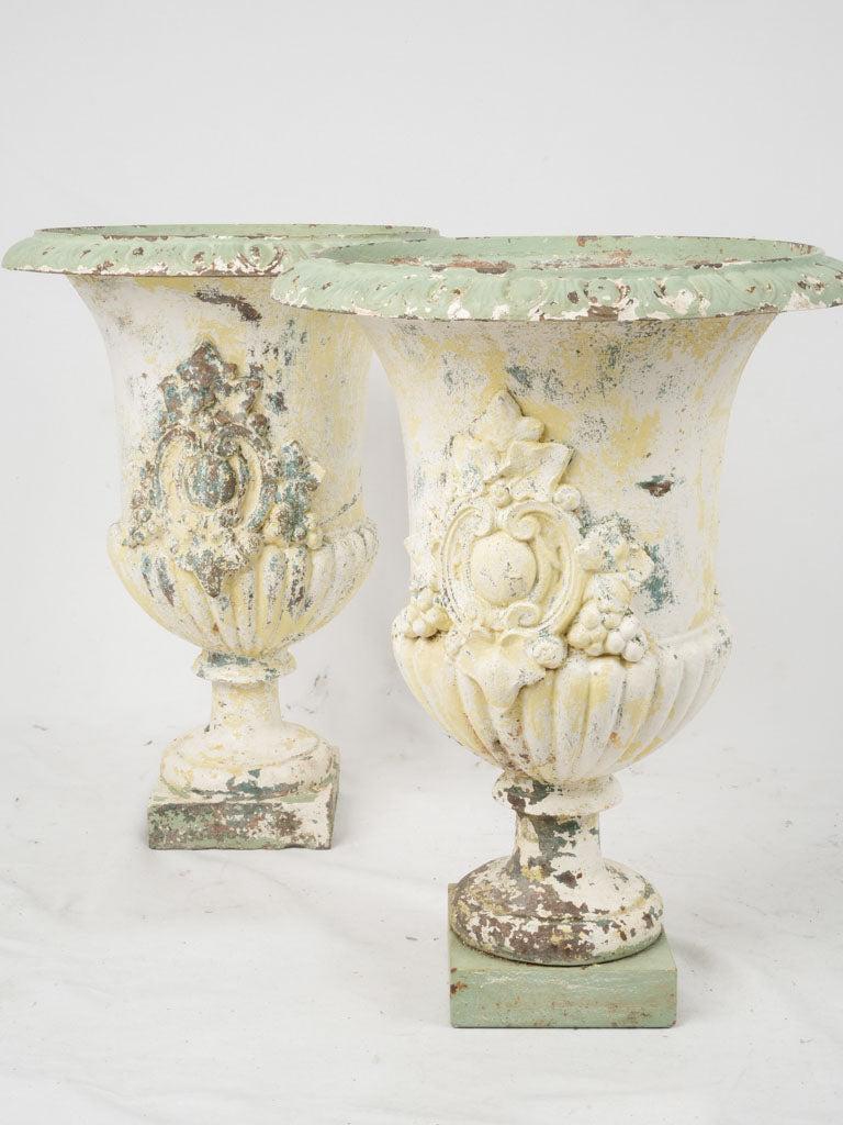 Vintage pair of large cast-iron urns