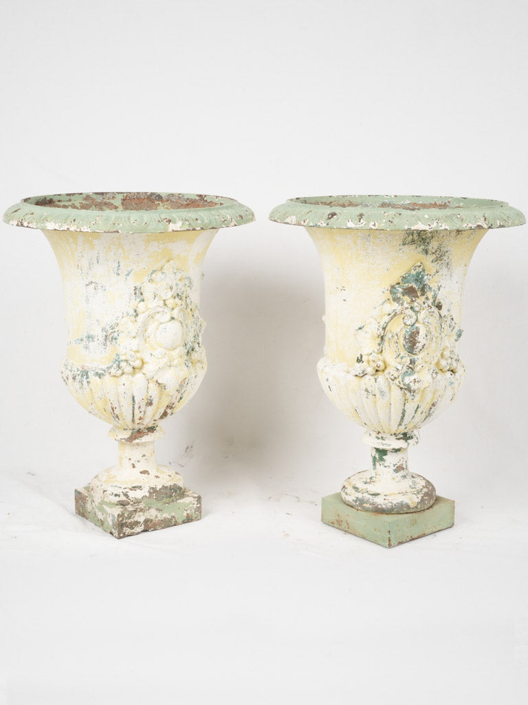 Antique Medici-style urns in white