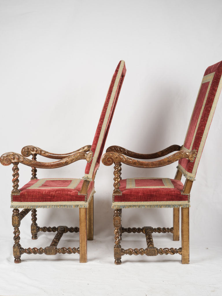 Intricately gilded, turn-of-the-century armchairs