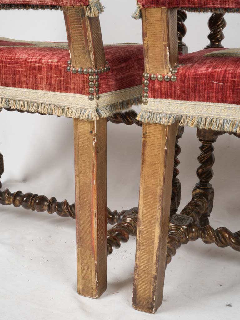 Plush, 19th-century red velvet armchairs