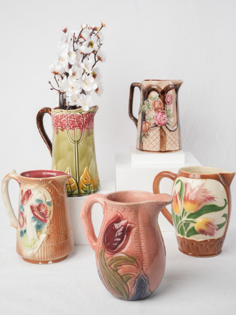 Set of Five Early 20th Century French Art Nouveau Majolica Pitchers