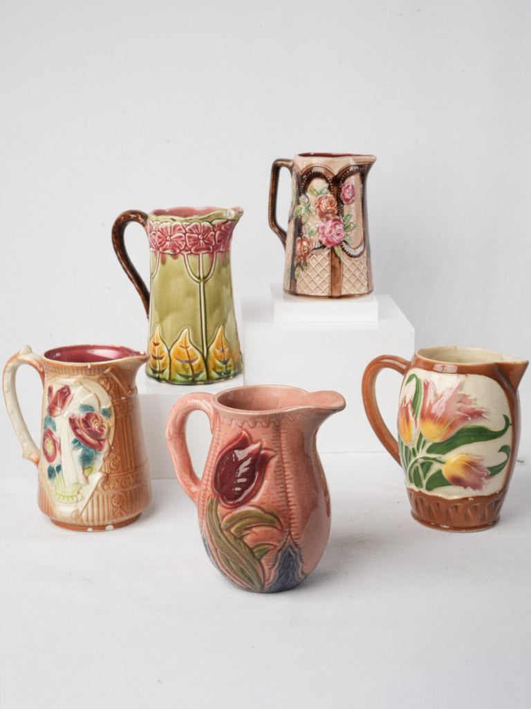 Set of Five Early 20th Century French Art Nouveau Majolica Pitchers