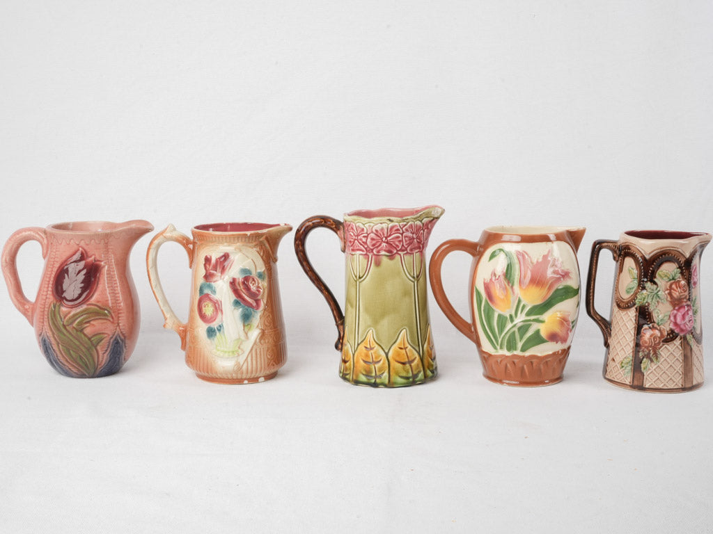 Set of Five Early 20th Century French Art Nouveau Majolica Pitchers