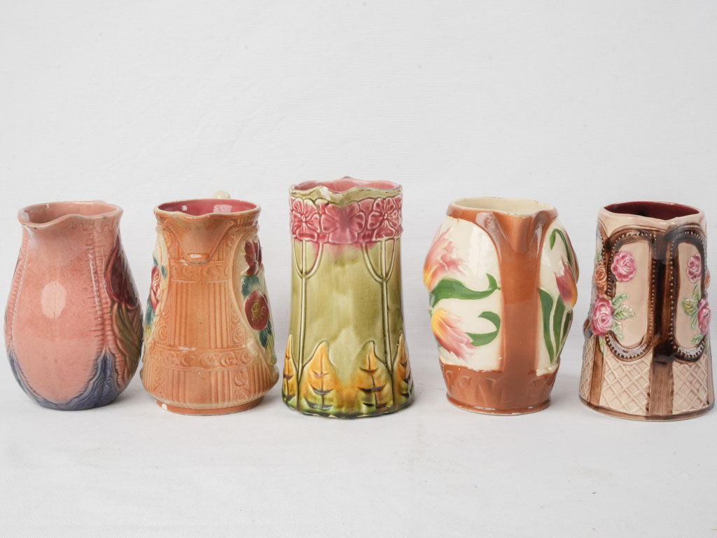 Set of Five Early 20th Century French Art Nouveau Majolica Pitchers