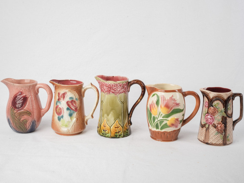 Set of Five Early 20th Century French Art Nouveau Majolica Pitchers