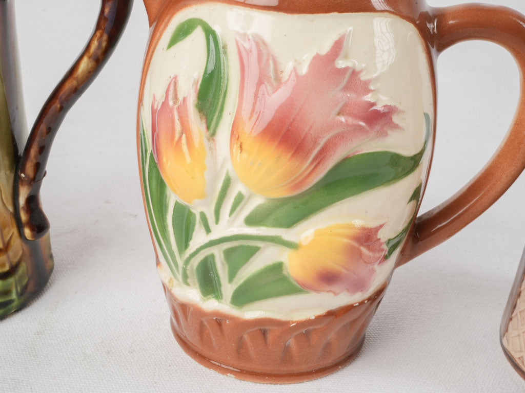 Set of Five Early 20th Century French Art Nouveau Majolica Pitchers