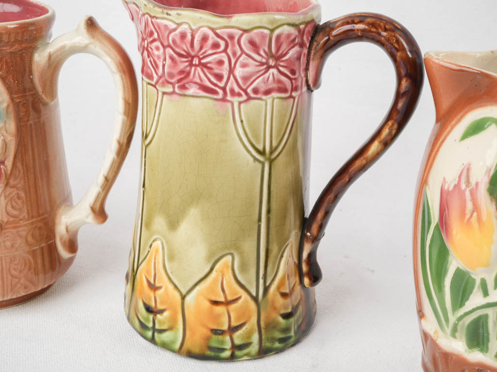Set of Five Early 20th Century French Art Nouveau Majolica Pitchers