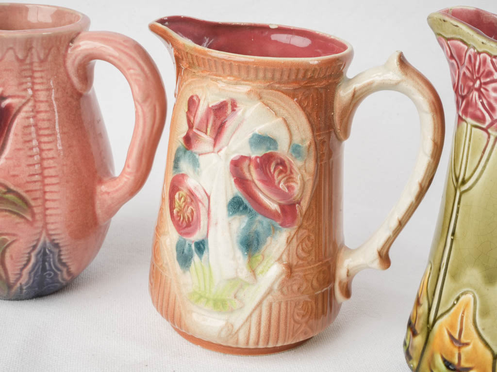 Set of Five Early 20th Century French Art Nouveau Majolica Pitchers