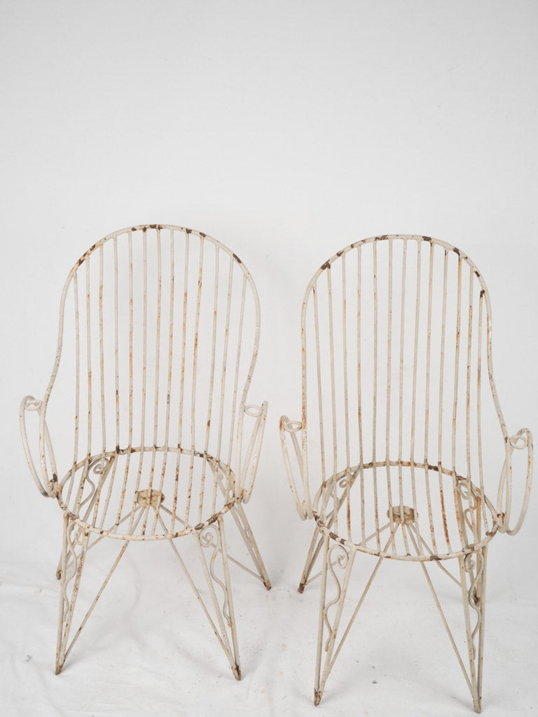 Stylish vintage white iron garden chairs