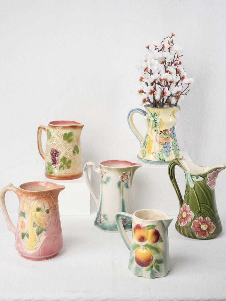 Set of Six Early 20th Century French Art Nouveau Majolica Pitchers