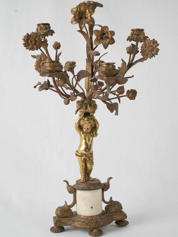Playful brass cherub decorative candelabra