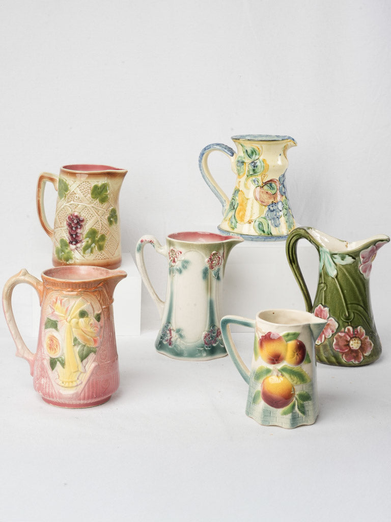Set of Six Early 20th Century French Art Nouveau Majolica Pitchers